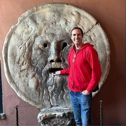 Standing next to the Mouth of Truth in Rome