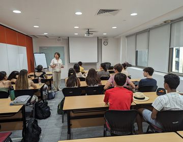 High school students sitting in classroom during orientation