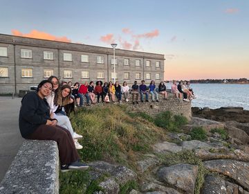 High school students in Rennes sitting near the water