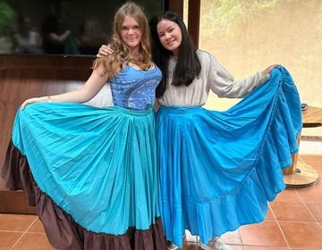 Students with traditional dresses.