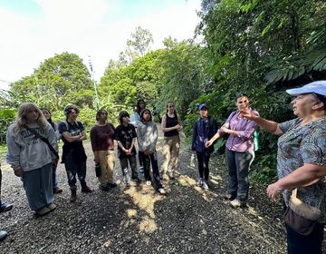 Coffee owner explains sustainable farm to students 