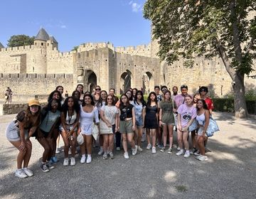 Group photo at entrance of Carcassonne