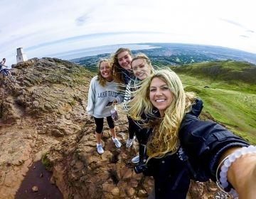 Glasgow girls on cliff taking a selfie together