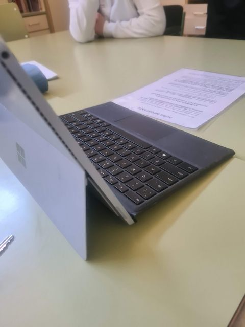 picture of laptop and paper