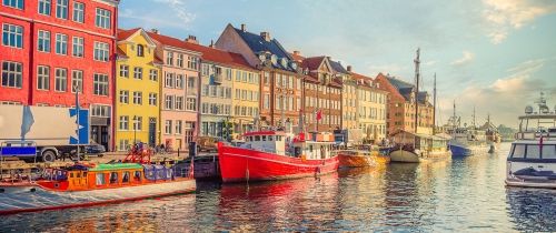 copenhagen canal with red boat