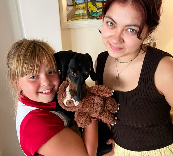 buenos aires student with her host sister and host puppy