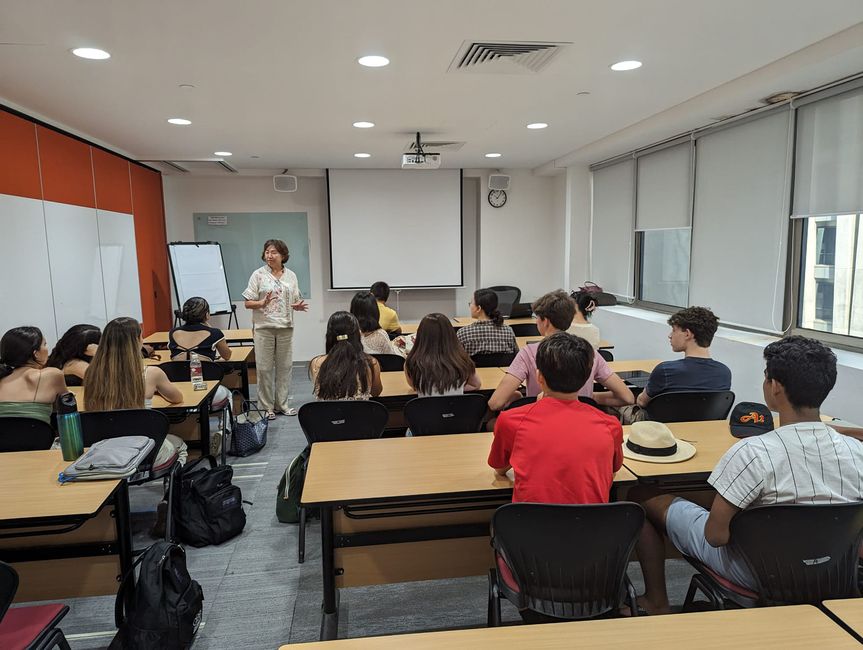 High school students sitting in classroom during orientation