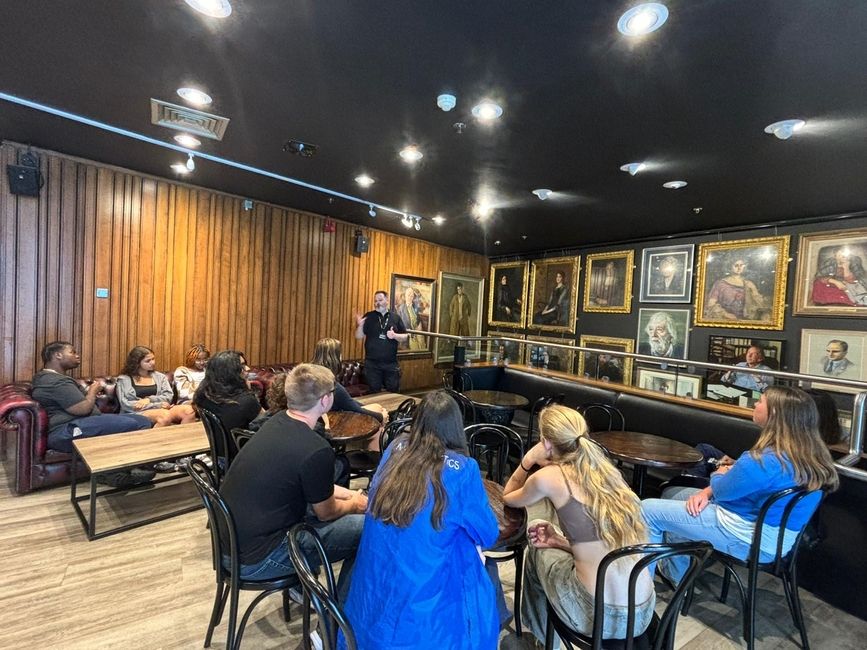 Students learning about the Abbey Theater portraits 