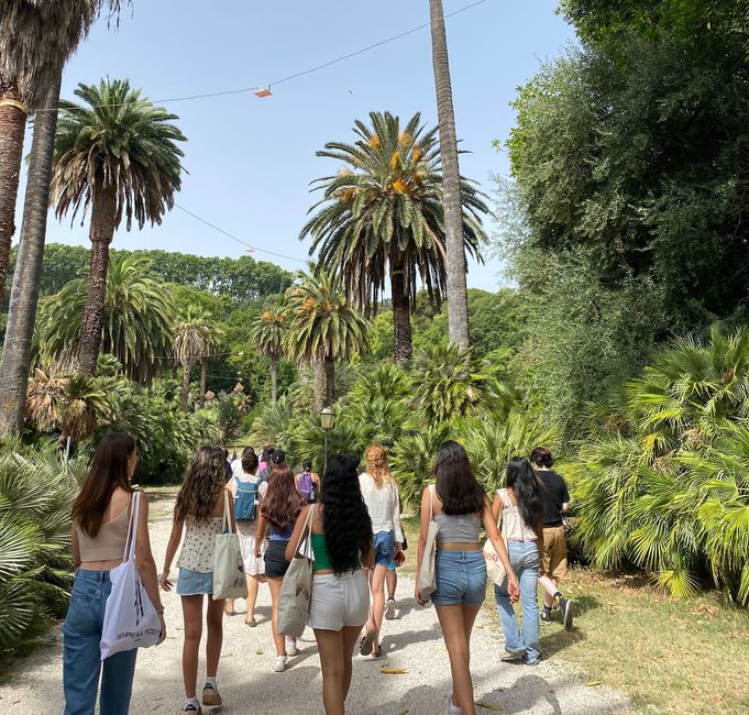 Students walking in the garden.