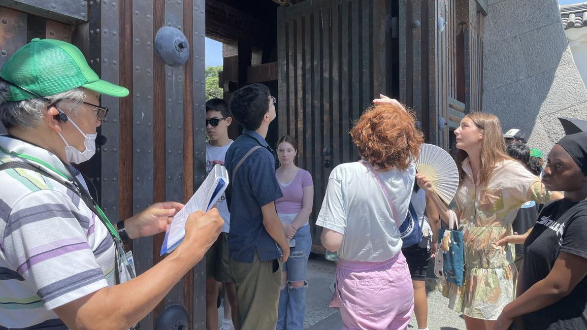 Students Explore the grounds of Odawara Castle accompanied by a tour guide 