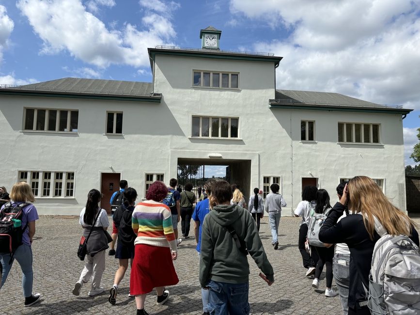 Students headed towards the entrance after arriving from train station