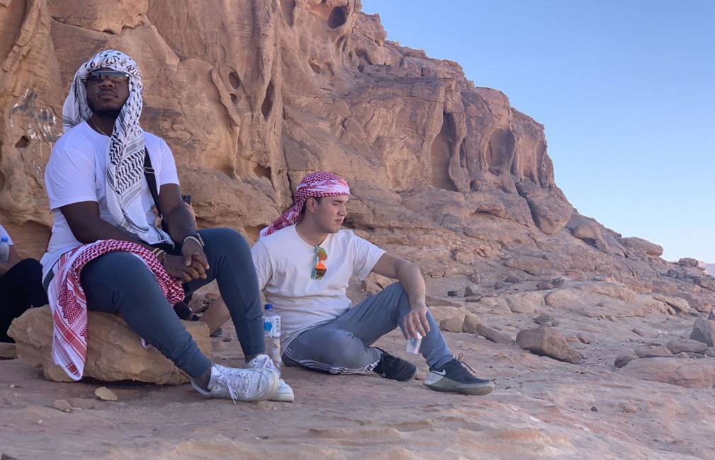 amman students sitting desert