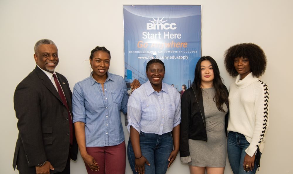 Dr. Anthony E. Munroe, President, Borough of Manhattan Community College with BMCC Students