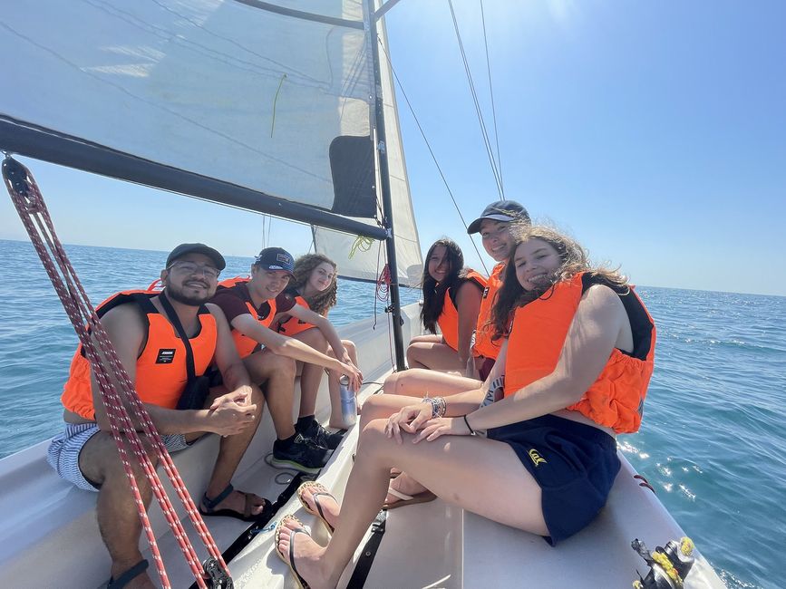 High school students on a boat wearing lifejackets