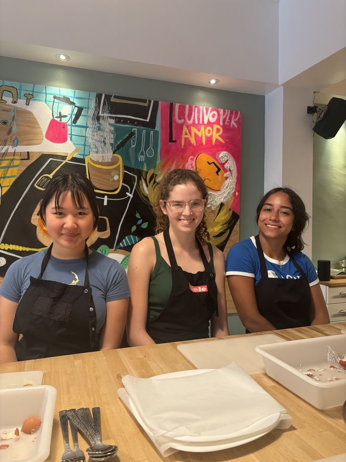 Girls getting ready for cooking class