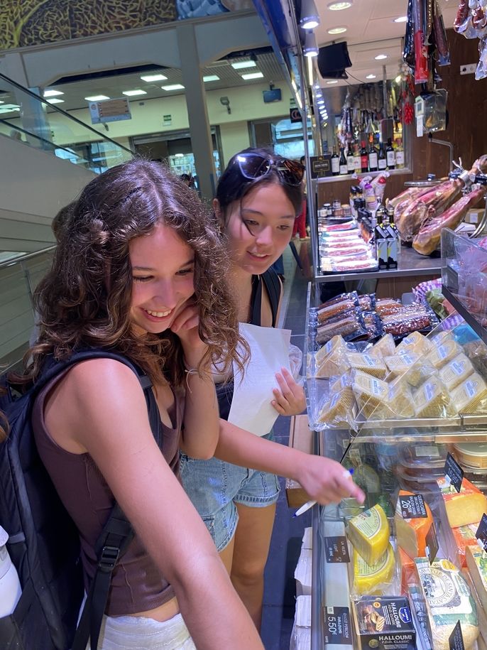 Shopping at the cheese stand