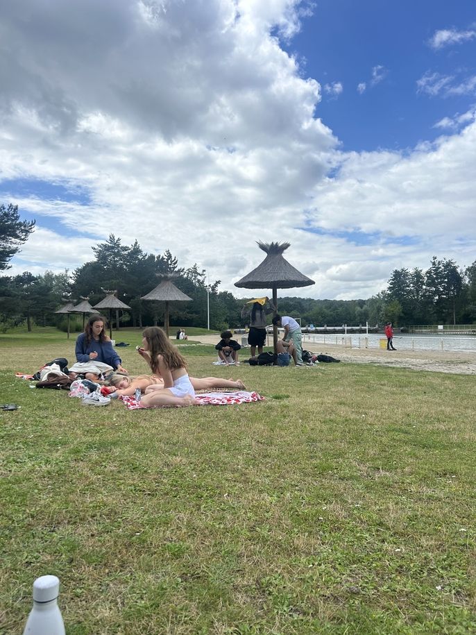 After finishing Accrobranche, the Fashion and Design students relax and socialize on the lakeside beach.