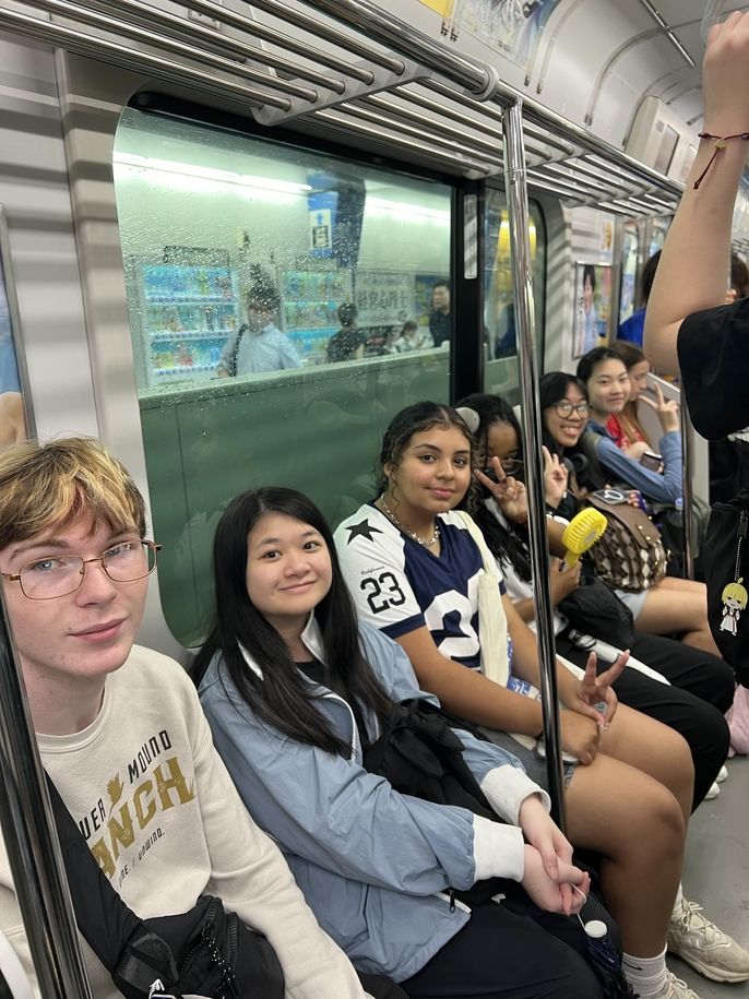 Global Navigators sitting on the train together as we make our way to Honjo.