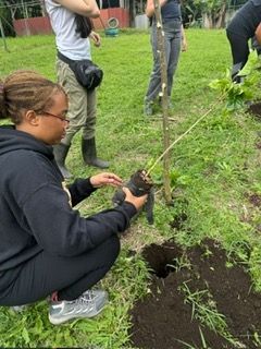 Emely getting ready to plant. 