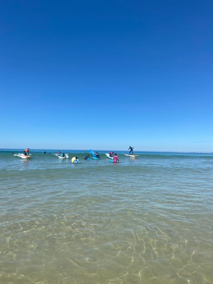 Our students learning to surf!