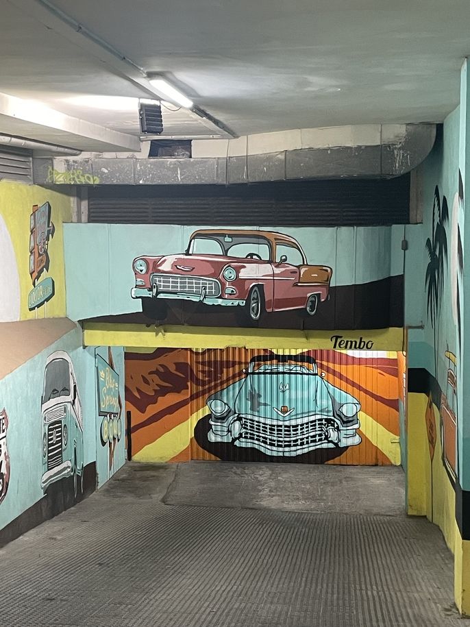 Art at the entrance of a garage.