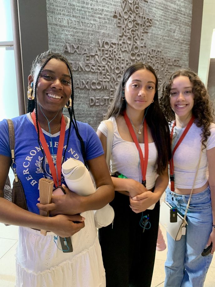 Students by the Doors on Passion Facade