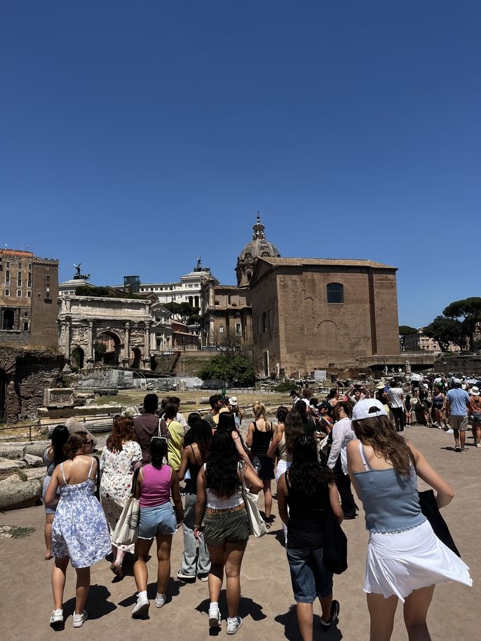 Students walking through the Forum