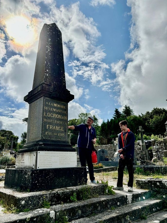 Michael and Andrew read through the list of Locronan soliders who died in WW1