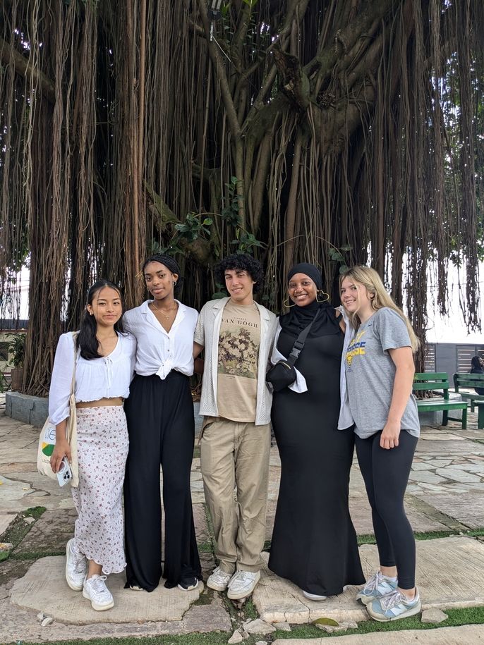 A group of friends pose together at the Manhyia Palace Museum