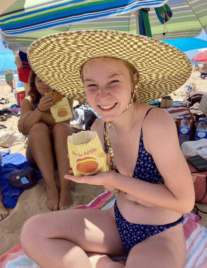 Leila enjoying her bola de berlim