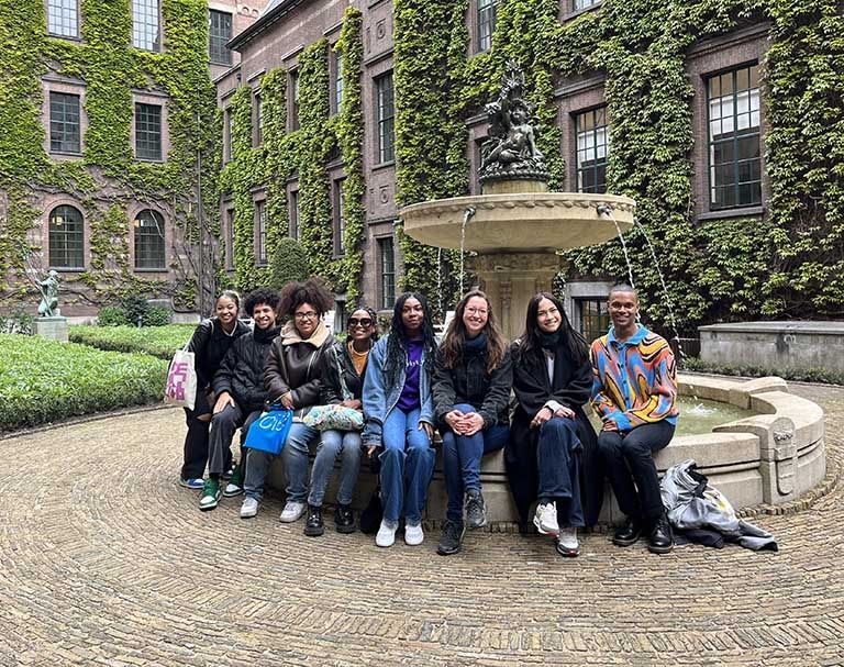 students at a fountain while studying abroad in amsterdam