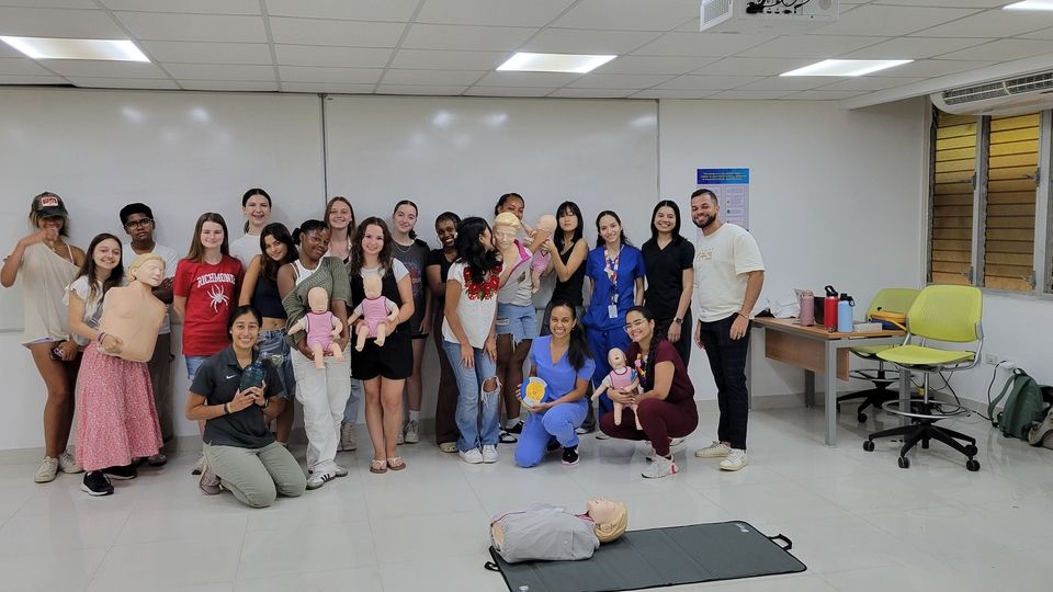 Group photo with medical school students after CPR class.