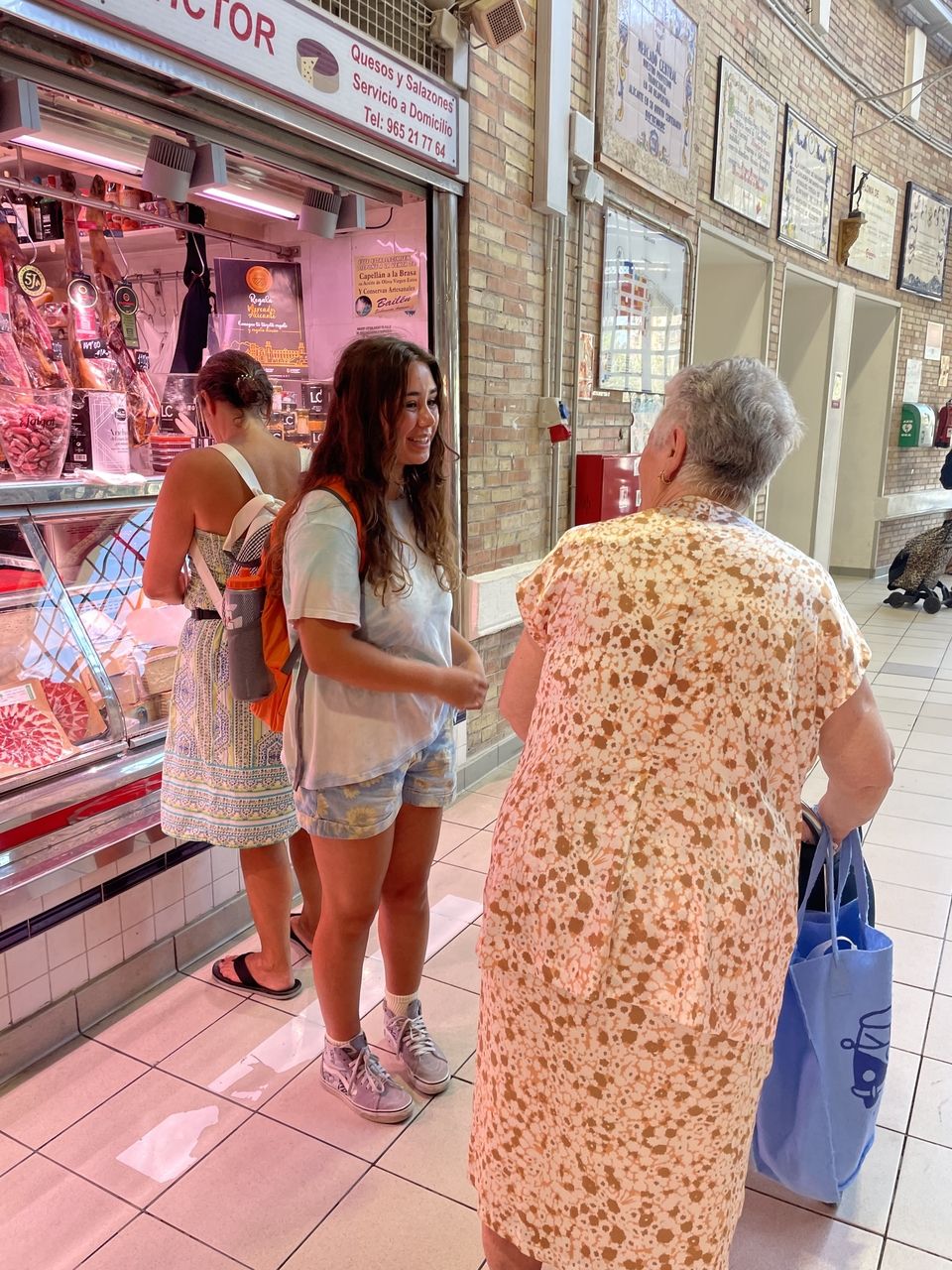 One of our students carrying out her Community Conversation in the Central Market!