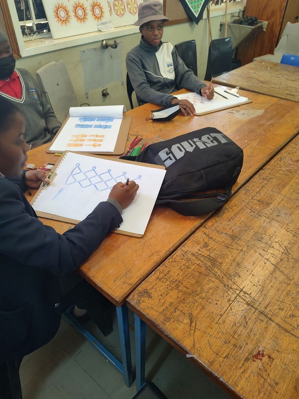 Students at Moselewapula Junior Secondary School in their art class