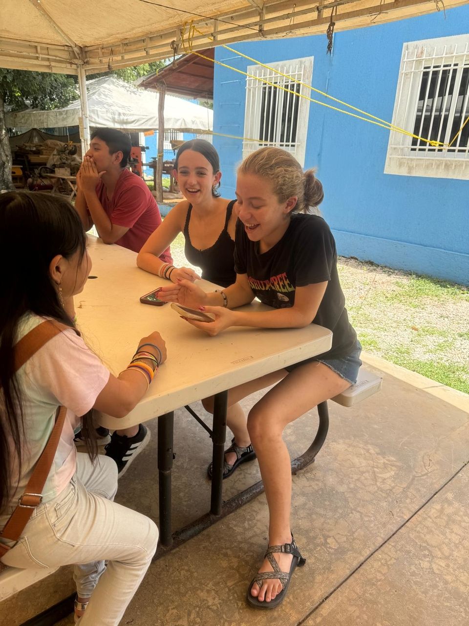 Students conversing with local students