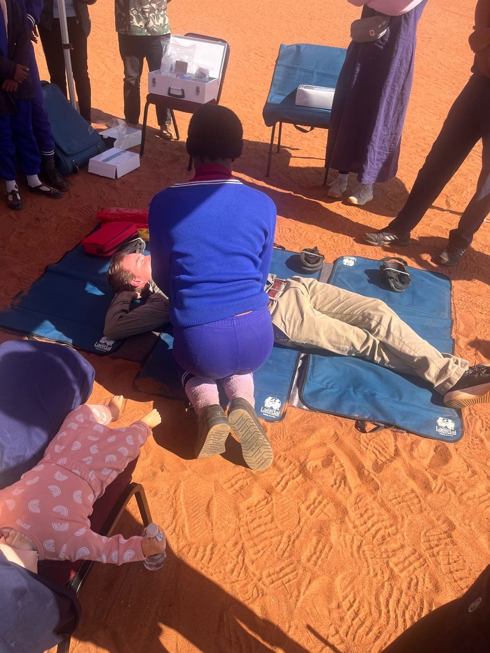 The community learning about CPR during the health Expo