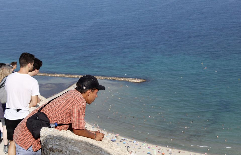 students looking mediterranean sea spain